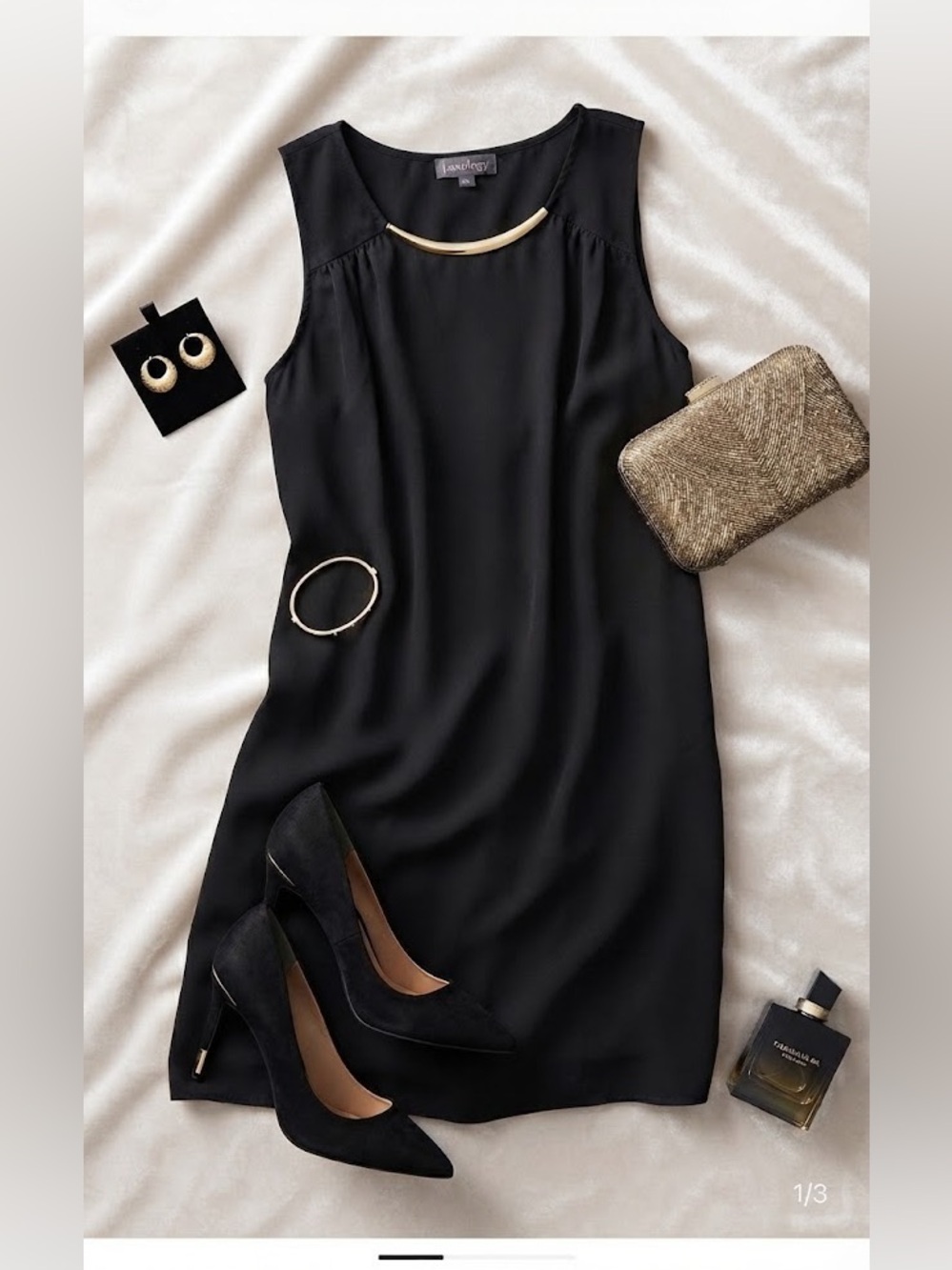 Luxology Black Sleeveless Mini Dress with Gold Neck Bar